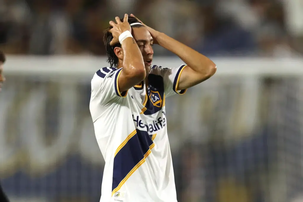 Galaxy defender JuliÃ¡n Aude shows his frustration at the end...