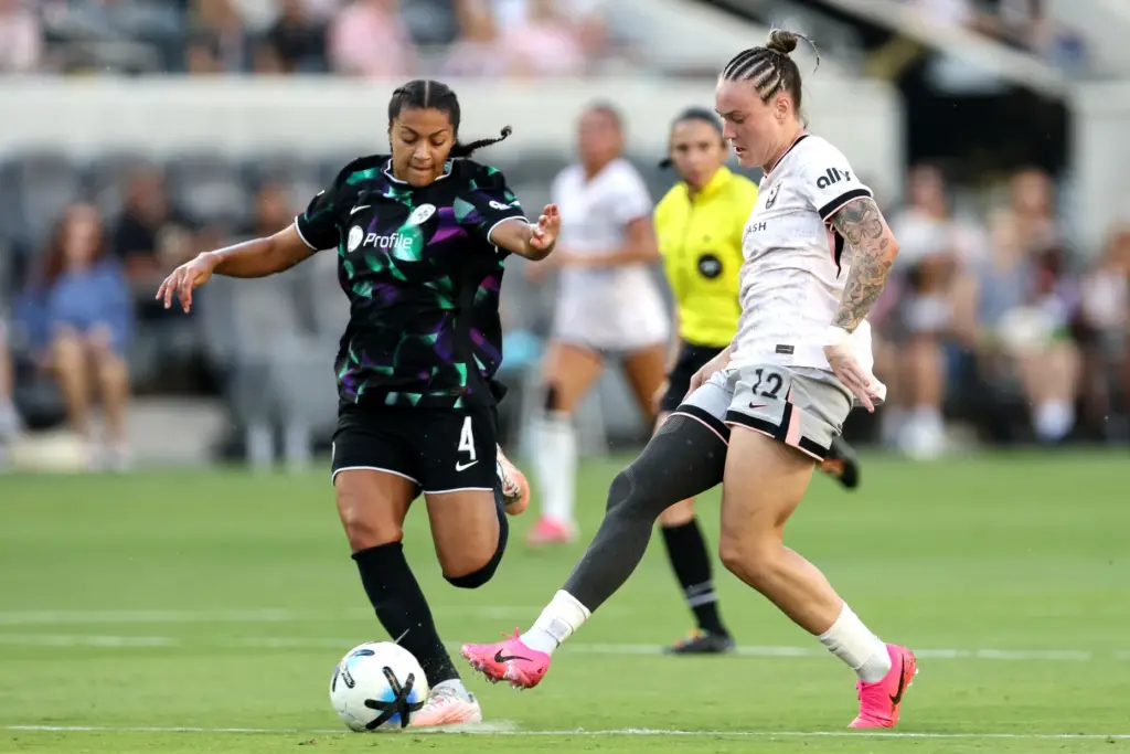 Angel City FC midfielder Maiara Niehues (12) kicks the ball...