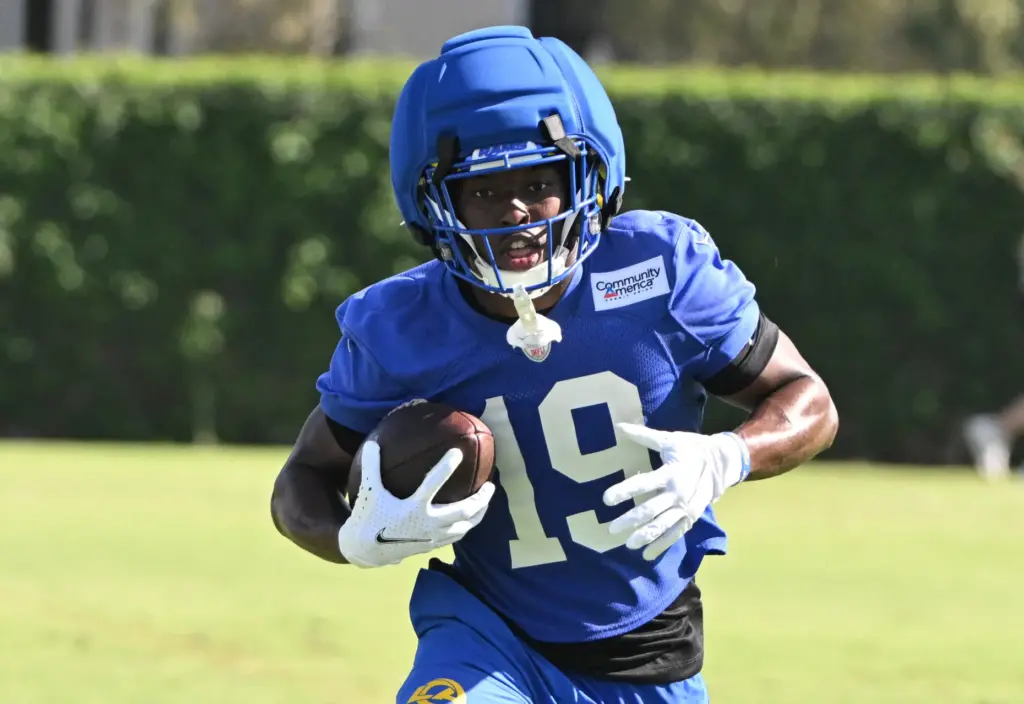 Rams wide receiver Xavier Smith runs with the ball during...