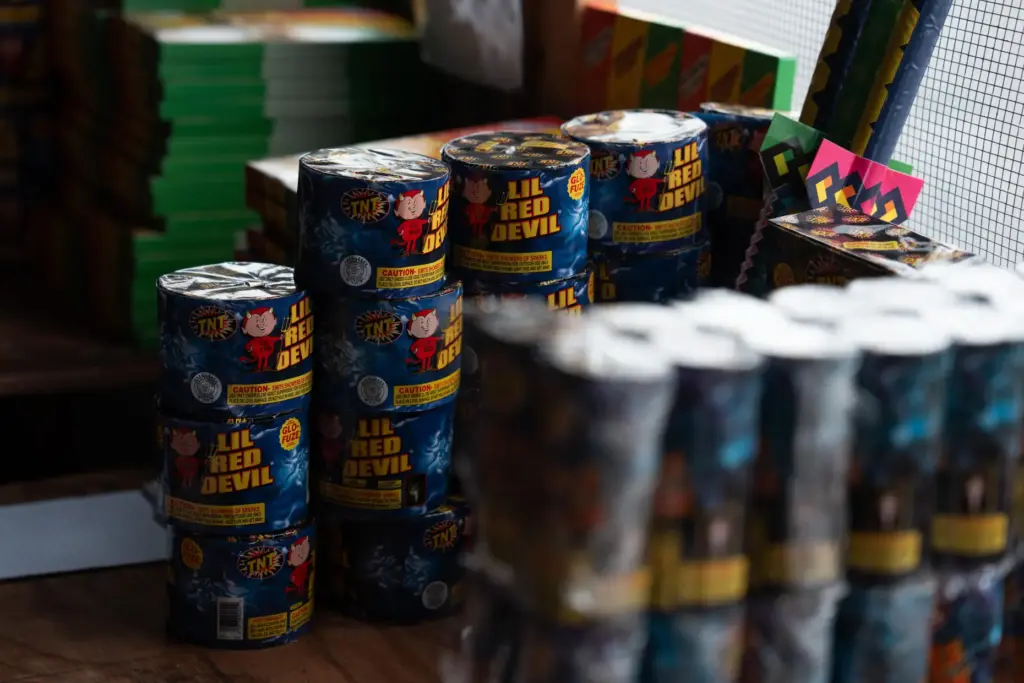 Packages of fireworks are displayed at a TNT Fireworks stand...