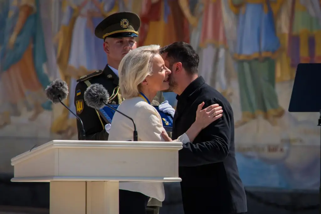 Ukrainian President Volodymyr Zelenskyy greets European Commission President Ursula von der Leyen.