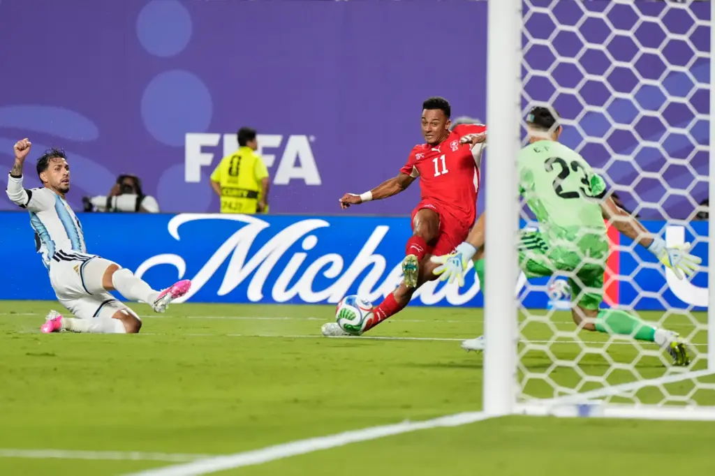 Switzerland’s Dan Ndoye (11) scores his team’s first goal during...
