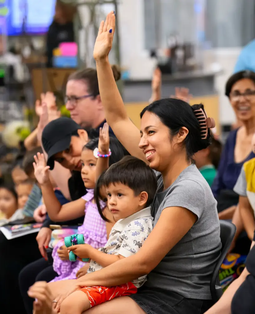 Mayra Orijuela of Cypress and her son Gael, 2, react...