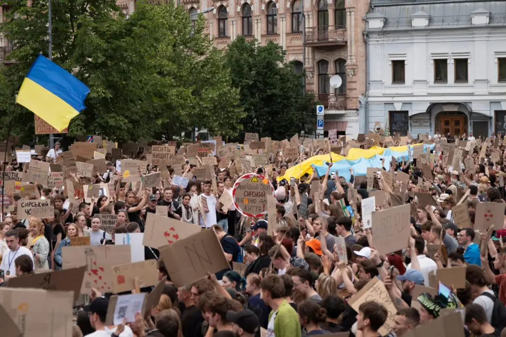 People gather to denounce President Volodymyr Zelenskyy's decision to dismiss Defense Minister Mykhailo Fedorov.