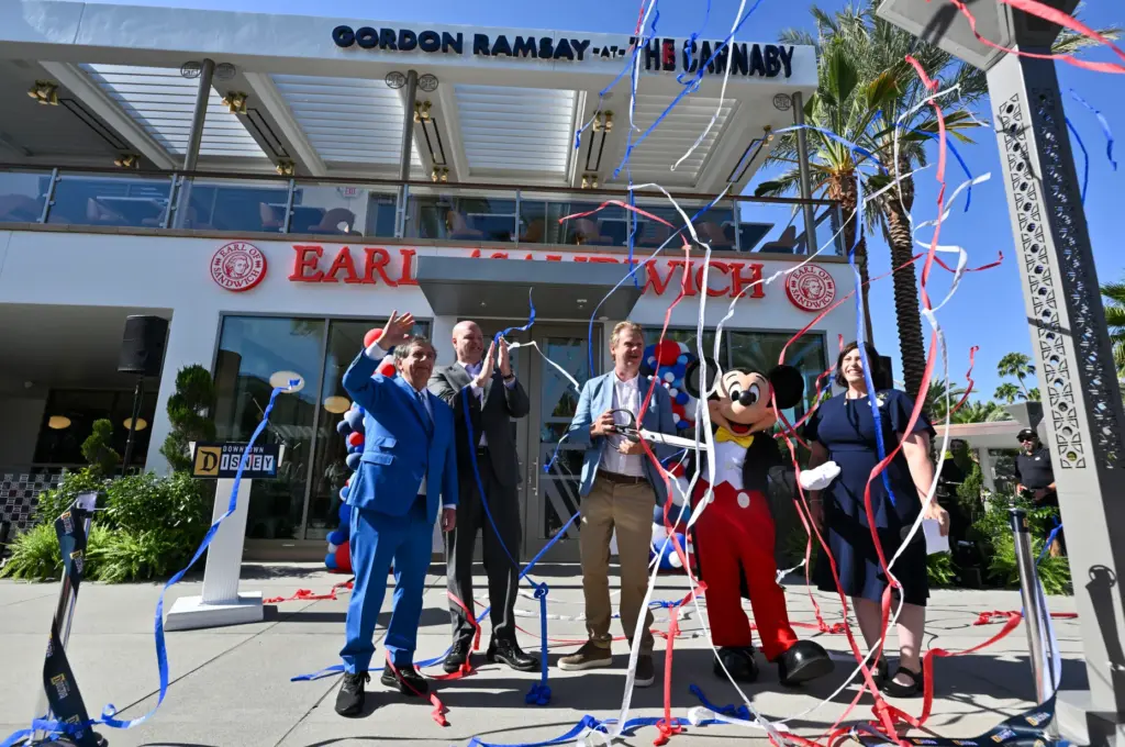 Luke Montagu, 12th Earl of Sandwich, center, joins Restaurateur Robert...