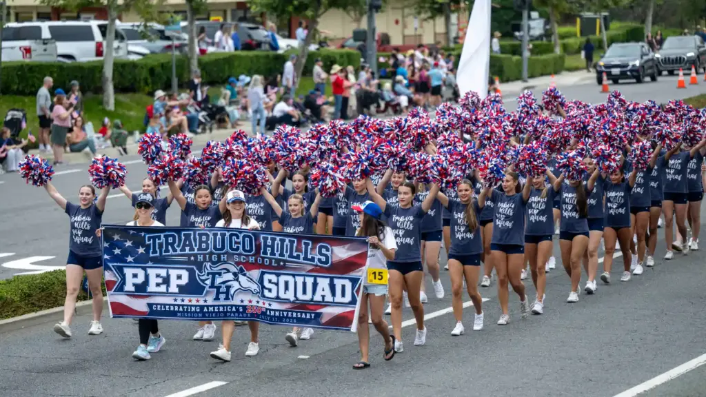 Trabuco Hills High School pep squad members perform as they...