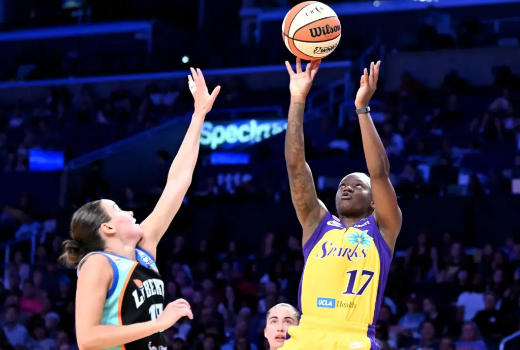 Sparks guard Erica Wheeler takes a shot as New York...