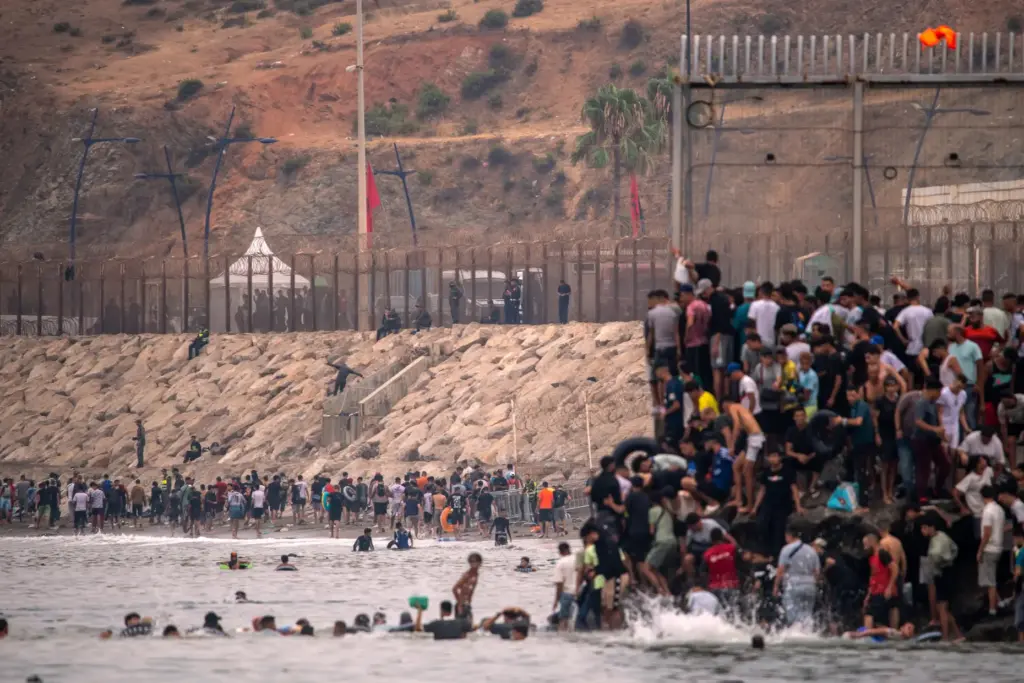 Migrants return to Morocco from the Spanish enclave of Ceuta.