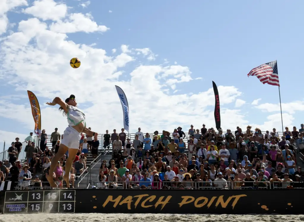 L.A. Launchâs Hagen Smith delivers his winning serve against Derek...