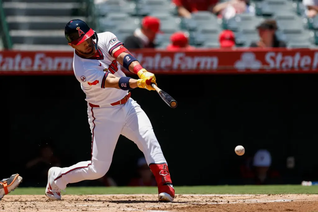 Angels’ Oswald Peraza hits an RBI single to run in...