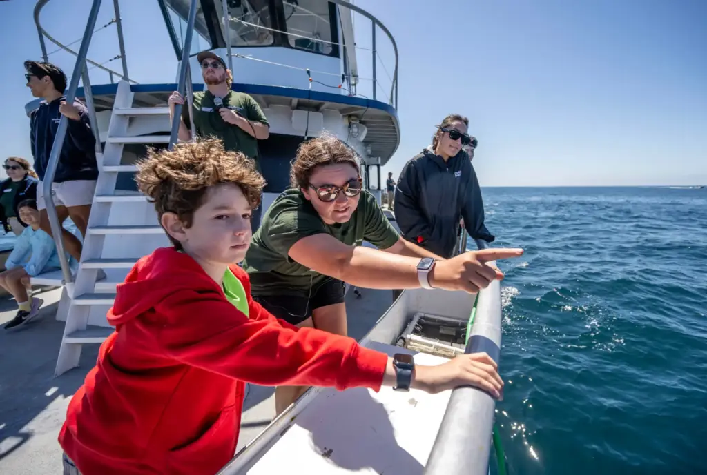 Cailin Holt, right, a Deck Hand aboard the Research Vessel...