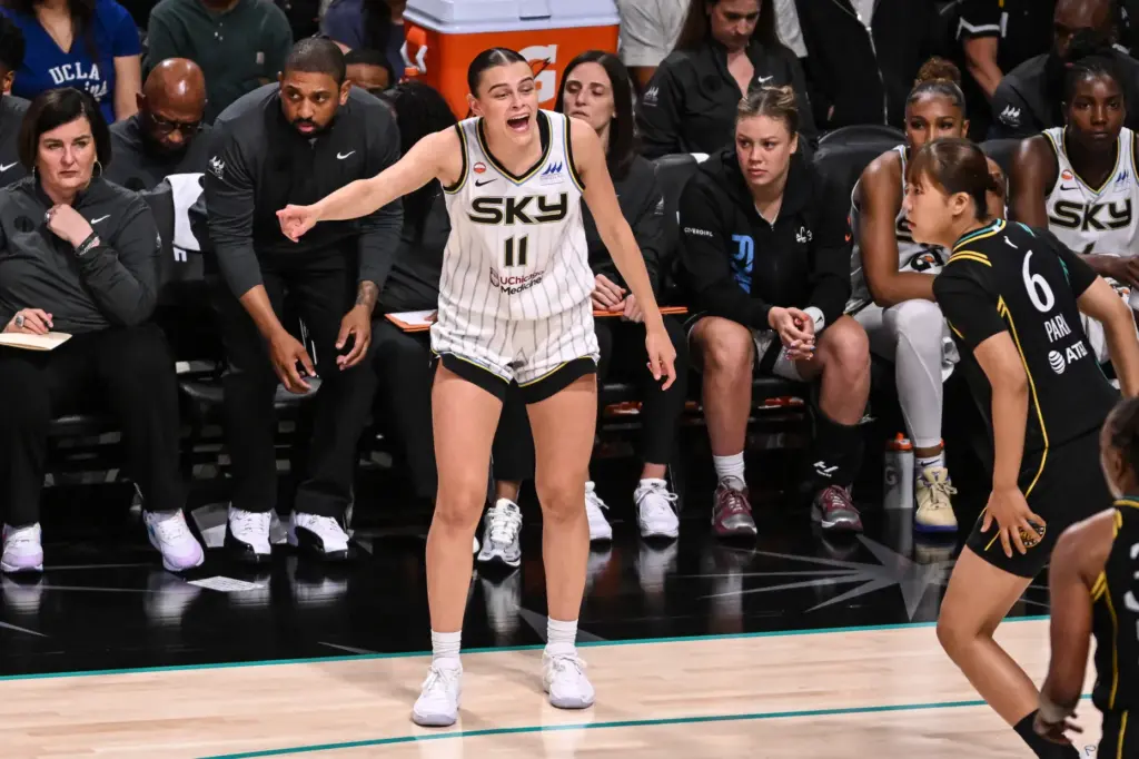 Chicago Sky rookie Gabriela Jaquez talks to her teammates during...