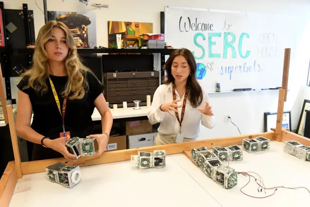 Undergraduates Emma Moreno and Isabella Pier demonstrate self-healing segmented robotic...