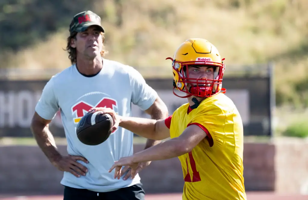 Mission Viejo High School quarterback Beckham Sharpe throws the ball...