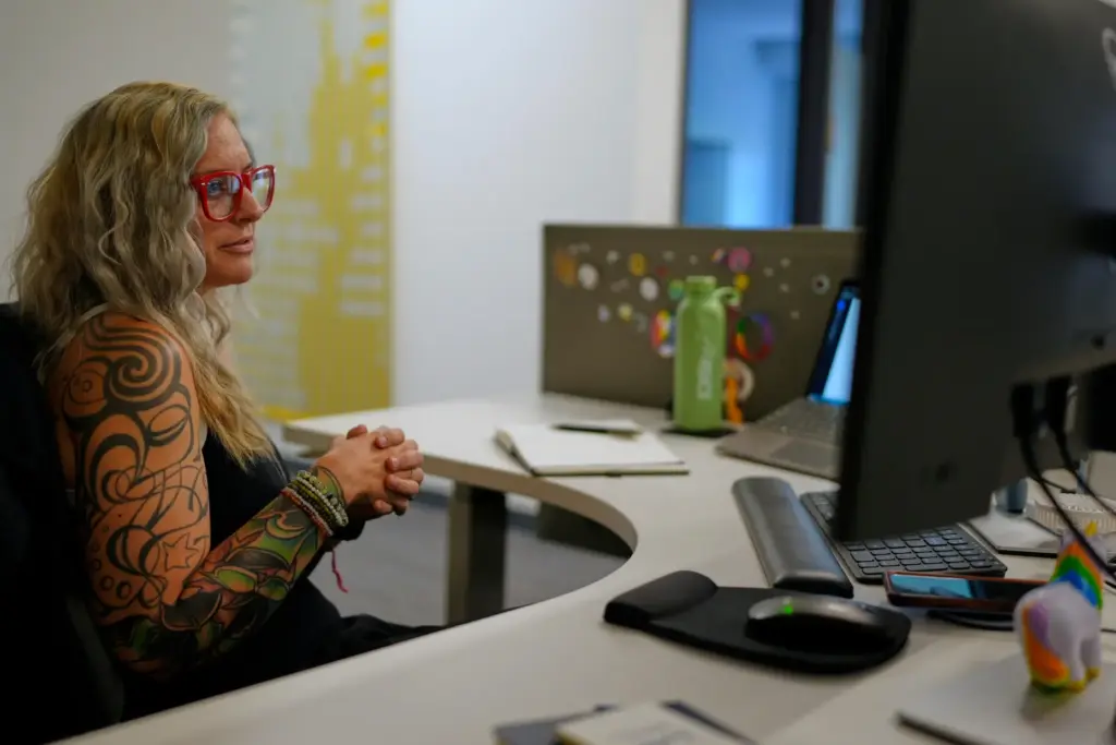 Deanna Danger uses AI to assist in her tasks as an administrative assistant.