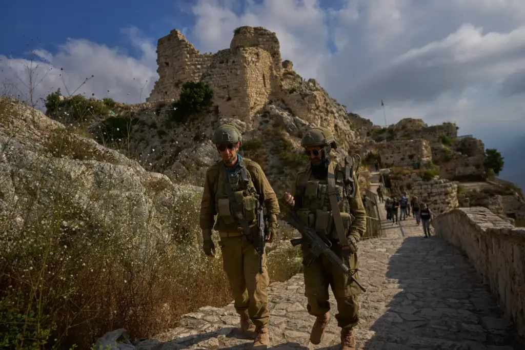 Israeli soldiers walk at the entrance to Beaufort Castle in...