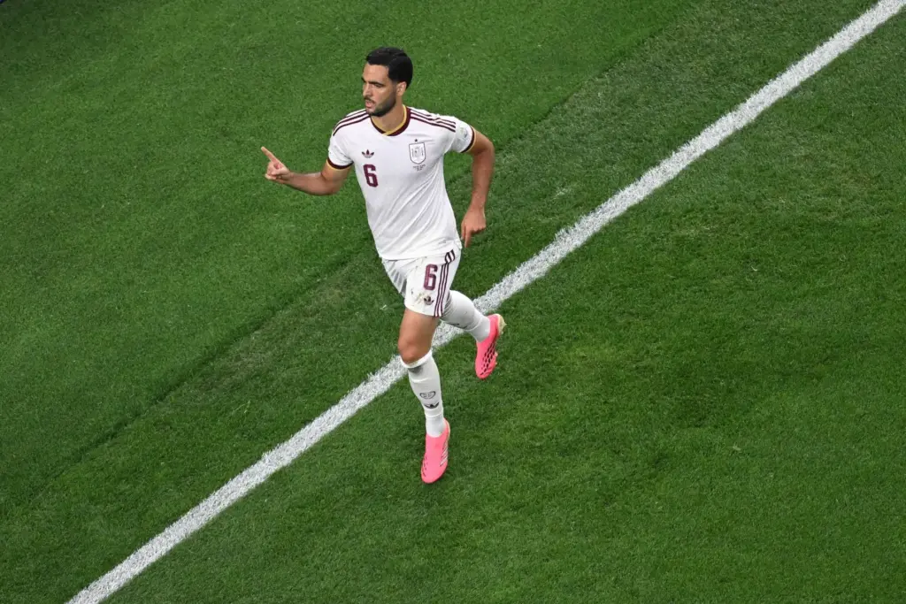 Spain’s Mikel Merino (6) celebrates after scoring the opening goal...