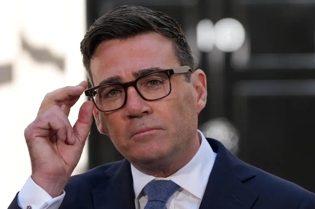 Britain's Prime Minister Andy Burnham speaks to staff and media at 10 Downing Street.