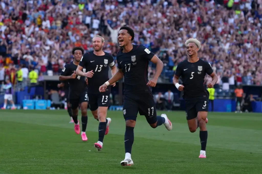 United States’ Malik Tillman (17) celebrates after scoring their first...