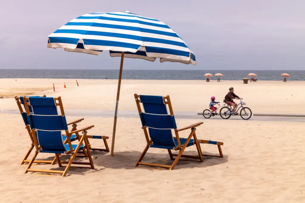 Beachgoers enjoy mild temperatures near the Santa Monica Pier on...