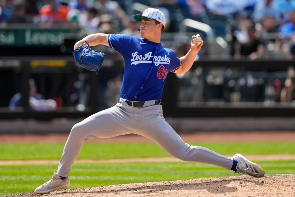 Dodgers pitcher Jack Dreyer throws during the sixth inning of...