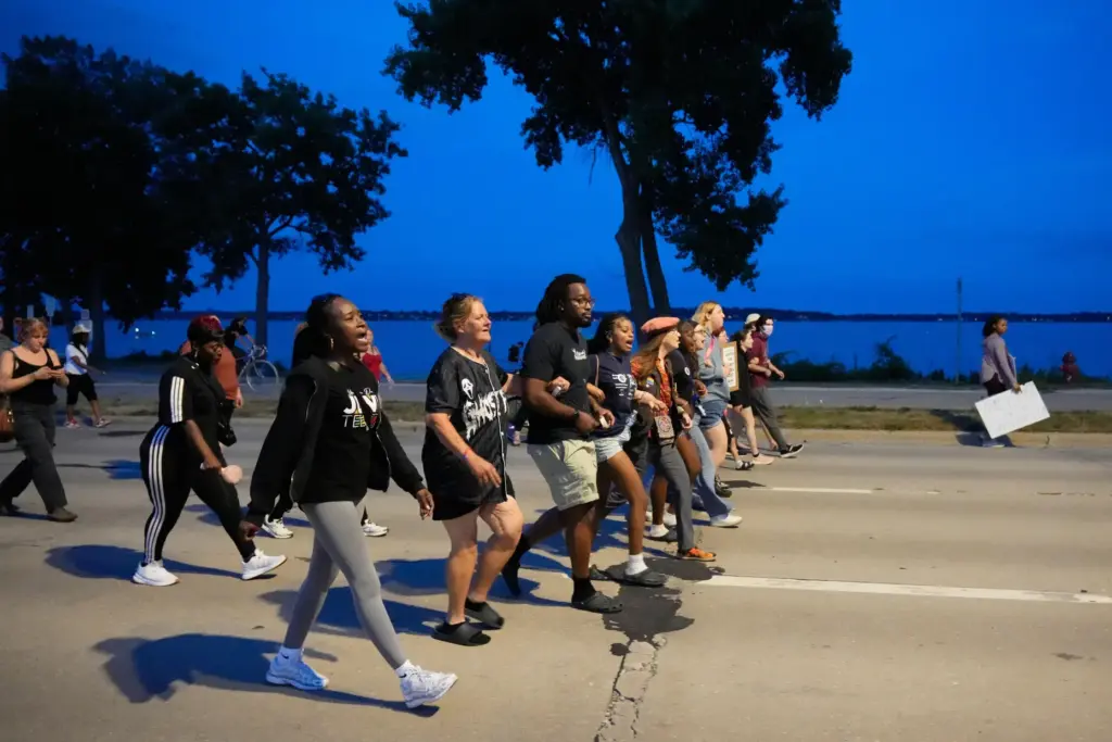 Protesters march Thursday, July 23, 2026, in Madison, Wis., after...