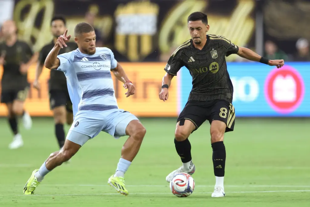Los Angeles FC midfielder Mark Delgado (8) controls the ball...