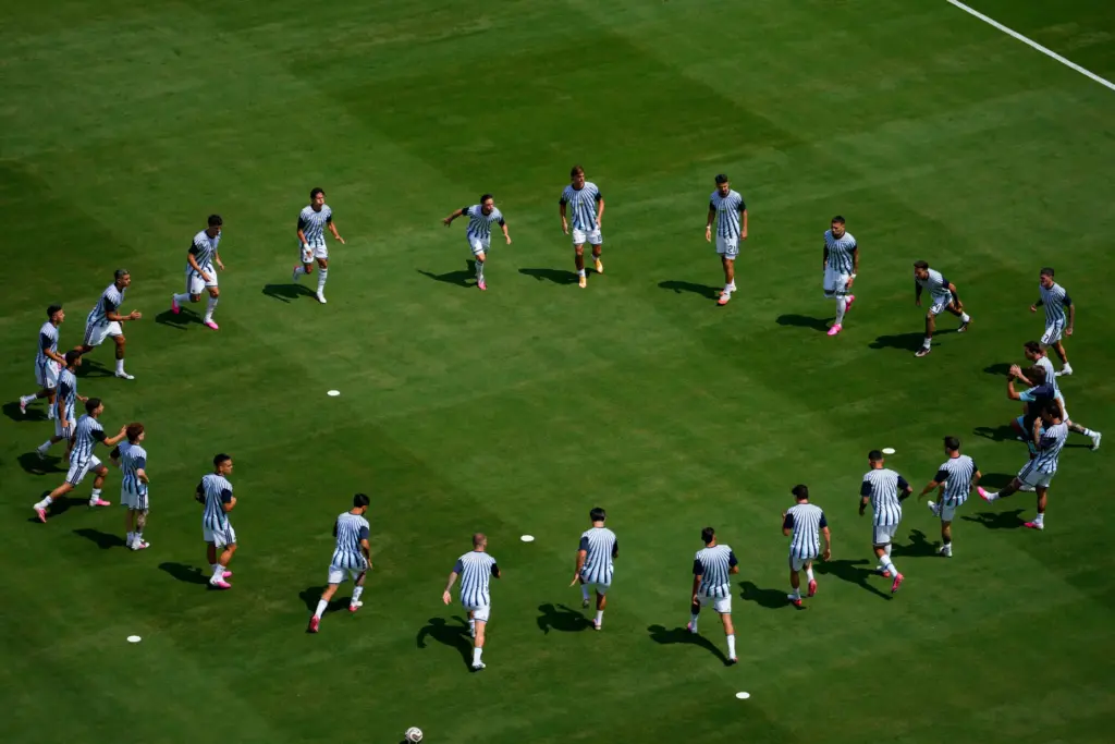 Argentina warms up prior to the World Cup final soccer...