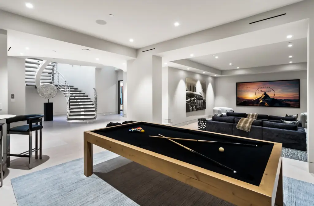 The subterranean entertainment spaces include a game area and media...