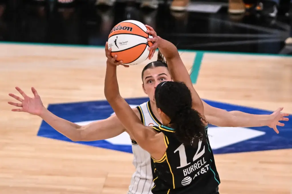 Chicago Sky rookie Gabriela Jaquez defends as the Sparks’ Rae...