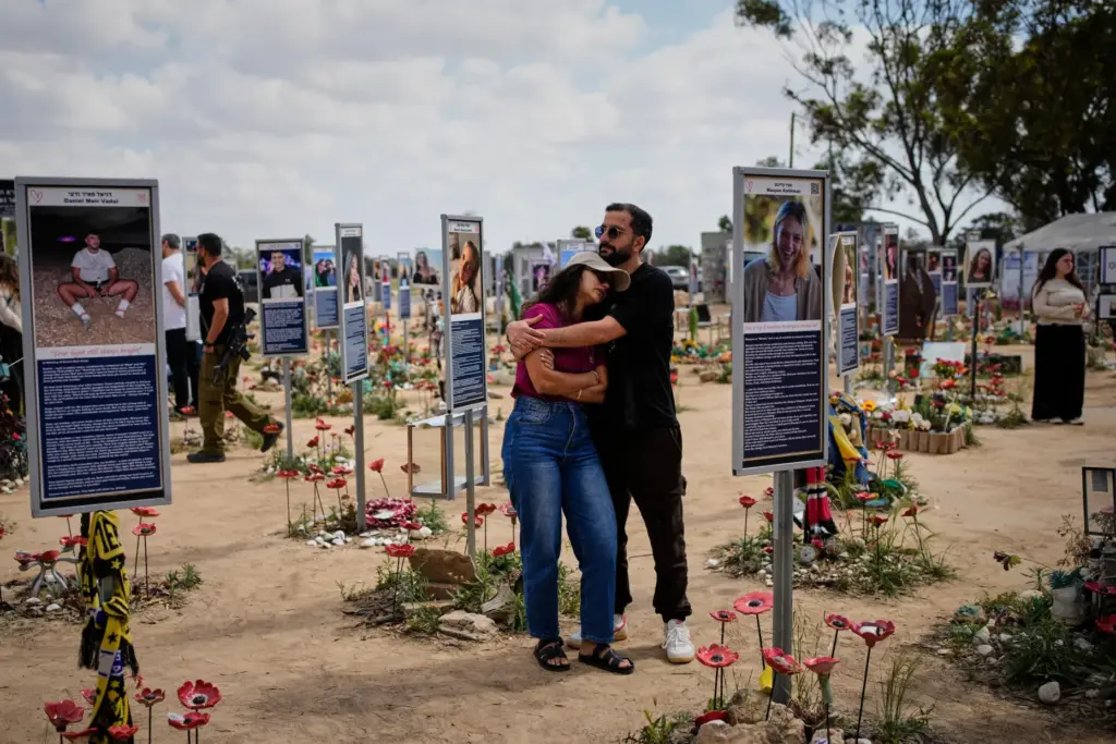 FILE – People mark Israel’s annual Memorial Day at the...