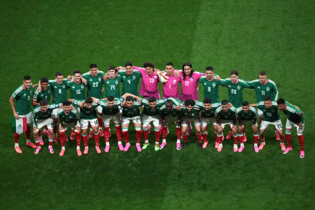 Mexico players pose before the World Cup round of 32...