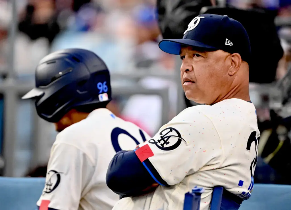 Manager Dave Roberts of the Dodgers looks on against the...