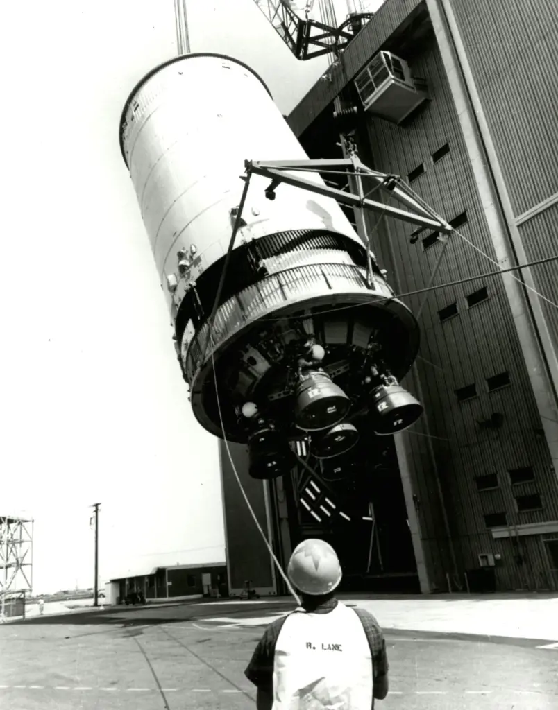 A S-II booster is lifted up at Boeing’s Seal Beach...