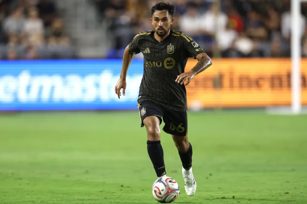 Los Angeles FC midfielder Mathieu ChoiniÃ¨re (66) moves the ball...