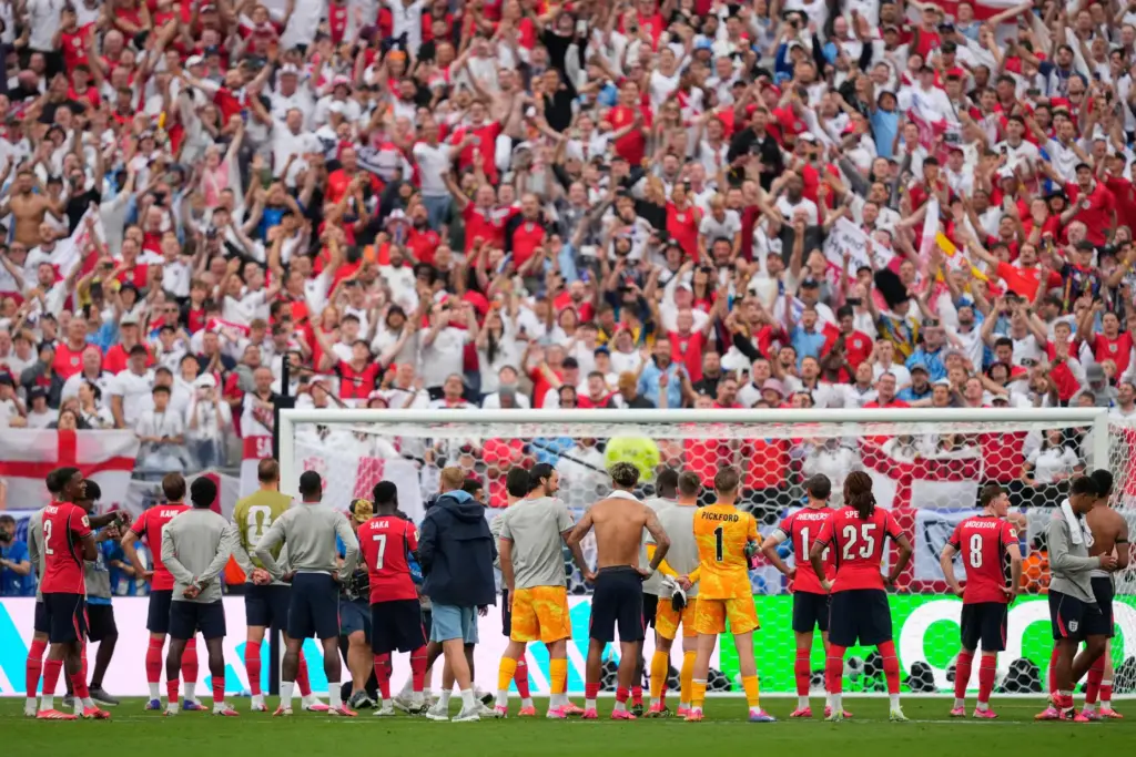England players face the crowd after a World Cup match against Panama.