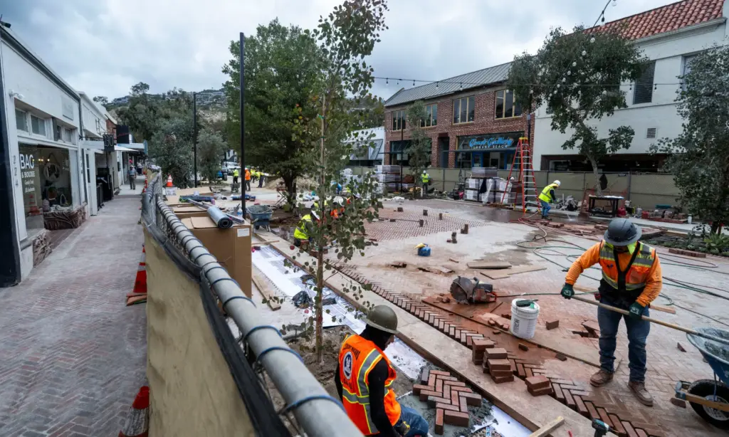 Work continues on the promenade along Forest Ave. in Laguna...