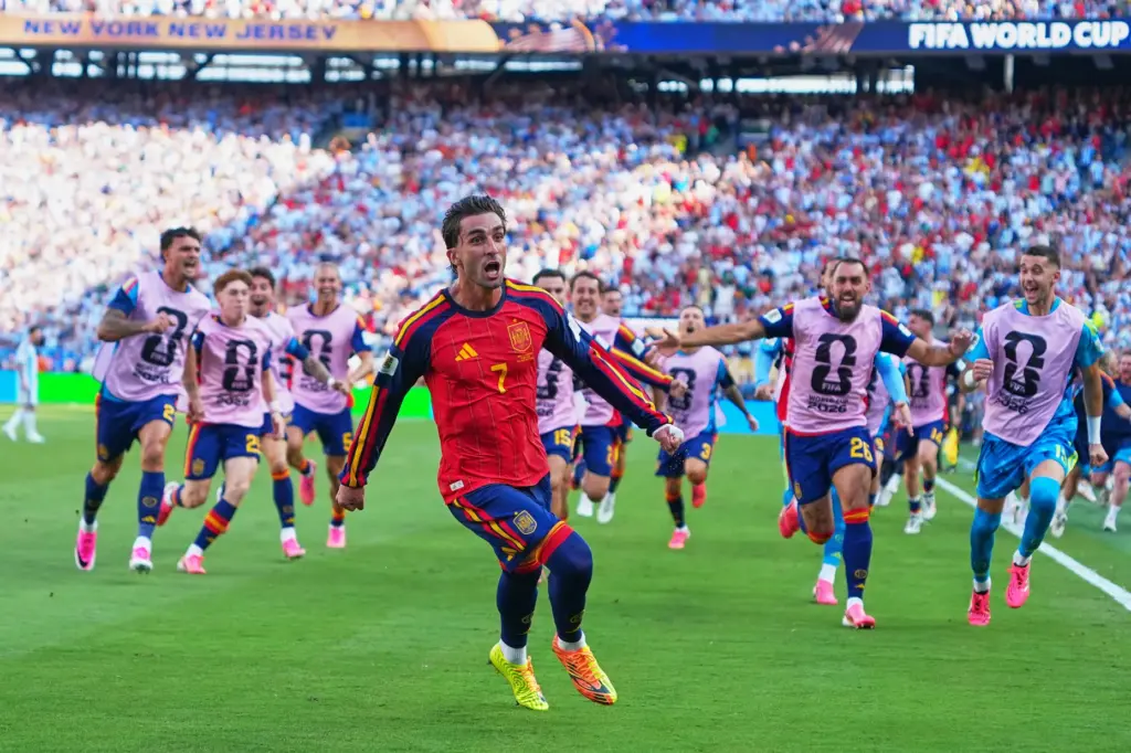 Spain’s Ferran Torres (7) celebrates scoring their first goal during...