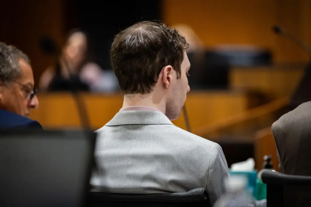 Tyler Robinson listens during a preliminary hearing at the Fourth District Court.