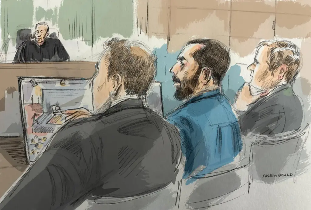 In this courtroom sketch, Hadi Matar, center, sits in federal...