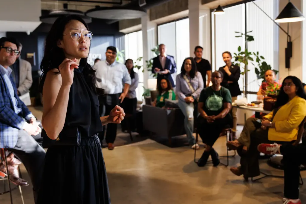 Insurance commissioner candidate Jane Kim speaks with guests at the...