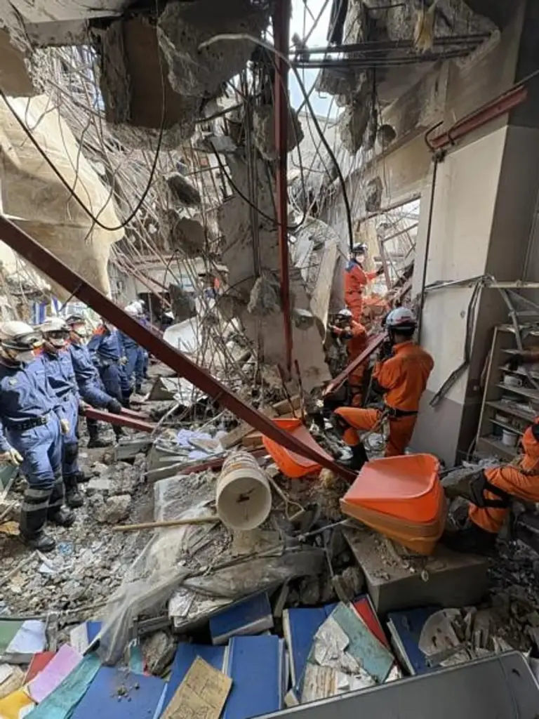 Firefighters during rescue operation inside Nippon Paper Industries factory.