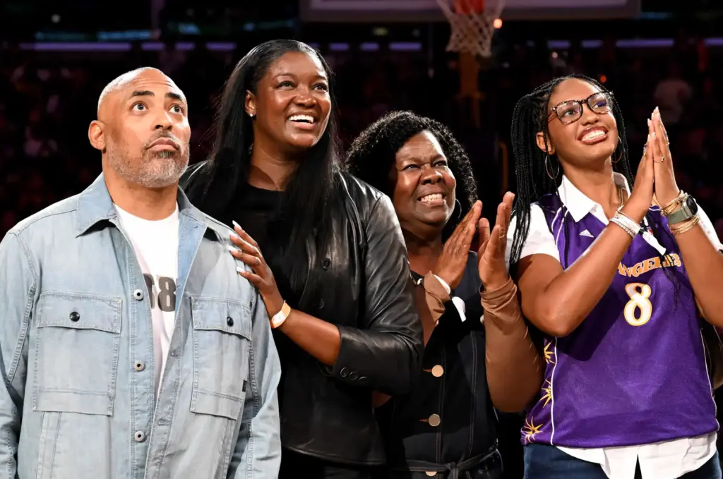 Former Sparks star DeLisha Milton-Jones, second from left, stands with...