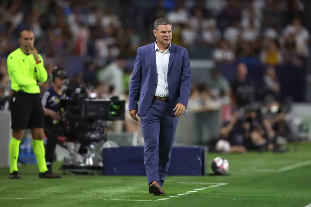 Galaxy head coach Greg Vanney looks on from the sideline...