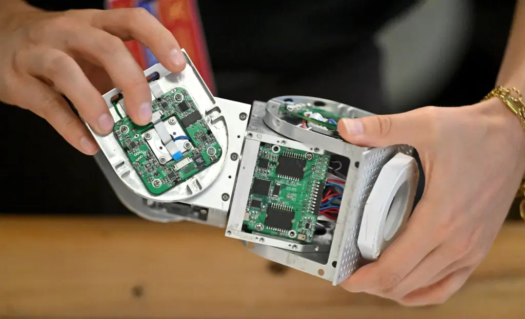 Undergraduates Emma Moreno and Isabella Pier demonstrate self-healing segmented robotic...
