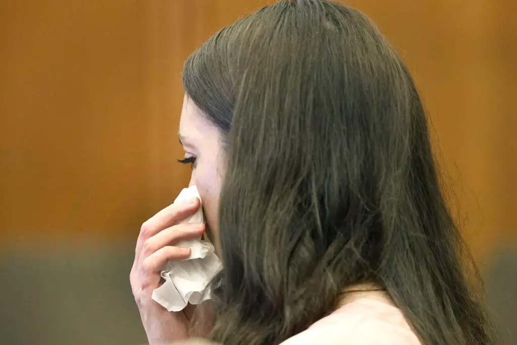 Defendant Lindsay Clancy fights back tears in court.