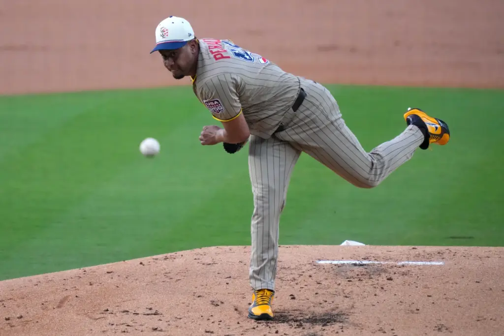 San Diego Padres starting pitcher Wandy Peralta throws to the...