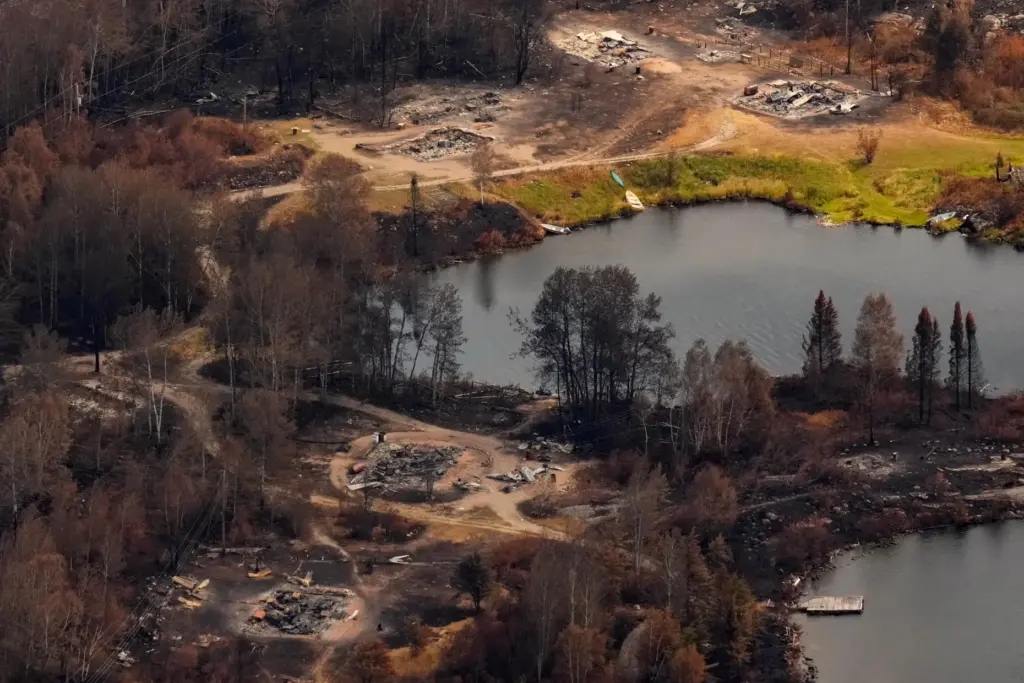 Debris from wildfire damage is visible at Collins First Nation in northwestern Ontario, Canada.