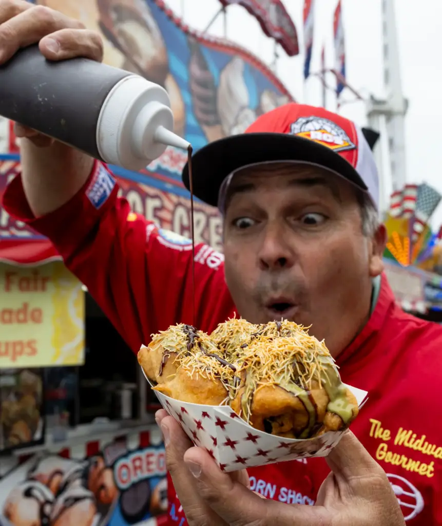 Dominic Palmieri tops off the Dubai Deep-fried Oreoâs at the...