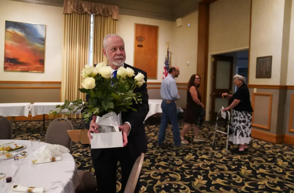 Rabbi Jeffrey Myers of the Tree of Life Congregation holds...